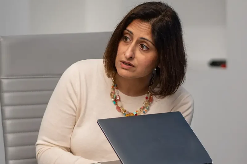 Priya in the boardroom